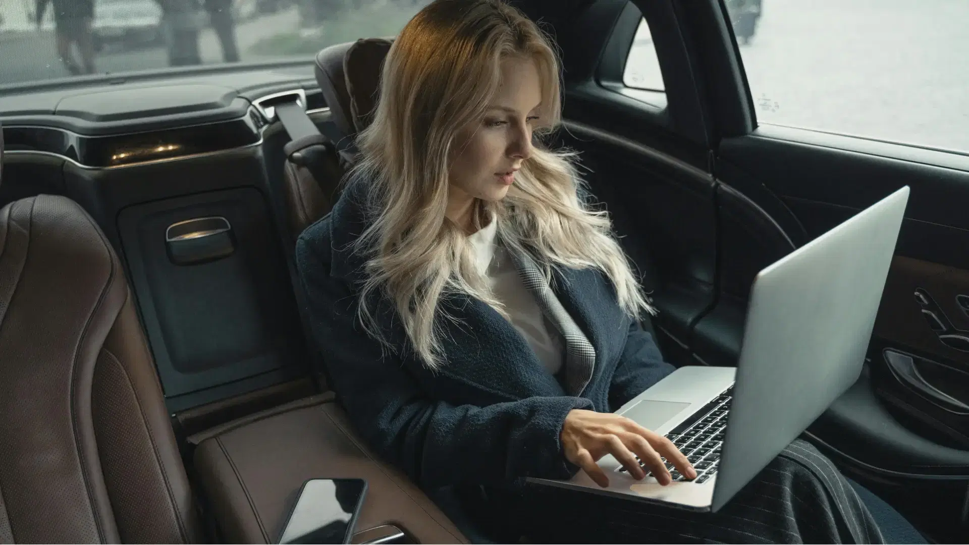 These Top 10 Cars Dominate America’s Buying Research Woman searching online