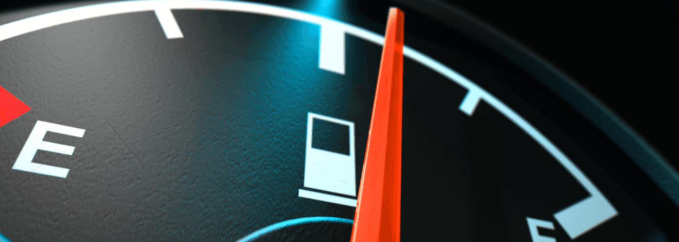 Close-up of a fuel gauge near full.