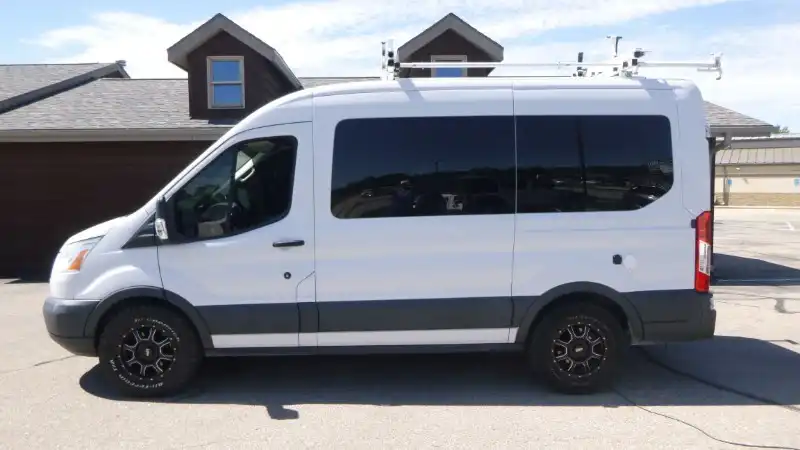 2015 Ford Transit 150 XLT Wagon Med Roof Sliding Pass. 130's photo