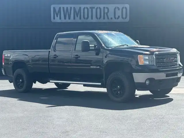 2013 GMC Sierra 4WD Crew Cab 8ft SLT SRW's photo