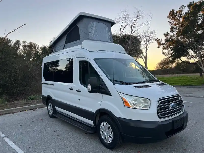 2015 Ford Transit 150 XLT Wagon Med Roof Sliding Pass. 130's photo