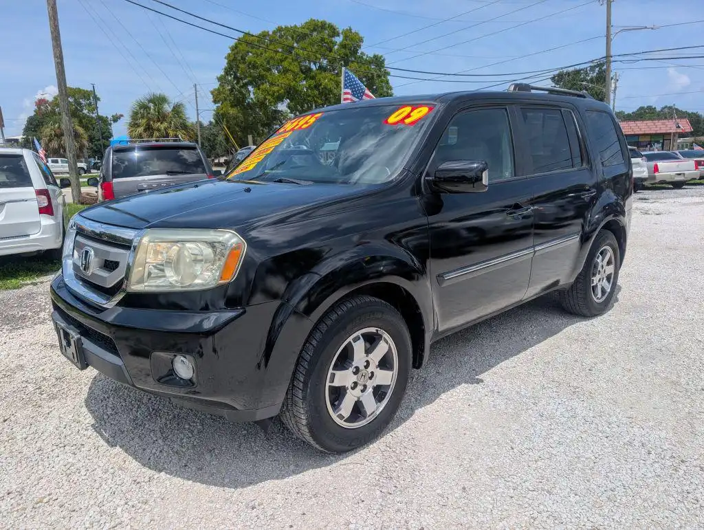 2009 Honda Pilot Touring w/ NAVI and RES 4WD's photo
