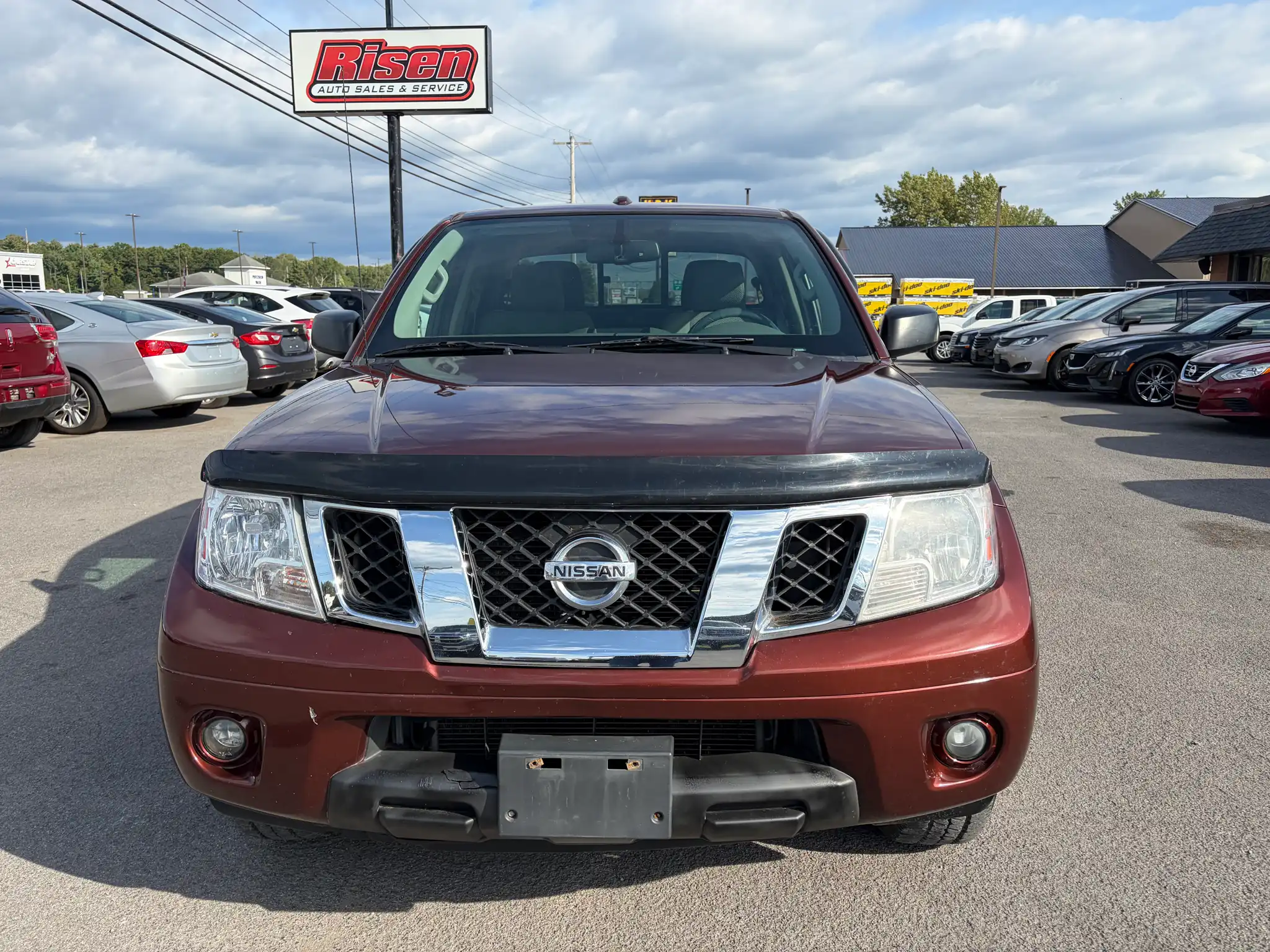 2016 Nissan Frontier 4.0 SV Crew Cab 4WD Auto SWB's photo