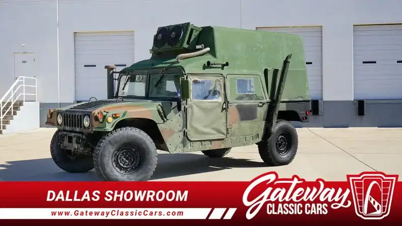 2000 Am General Hummer 4 Pass Open Top's photo