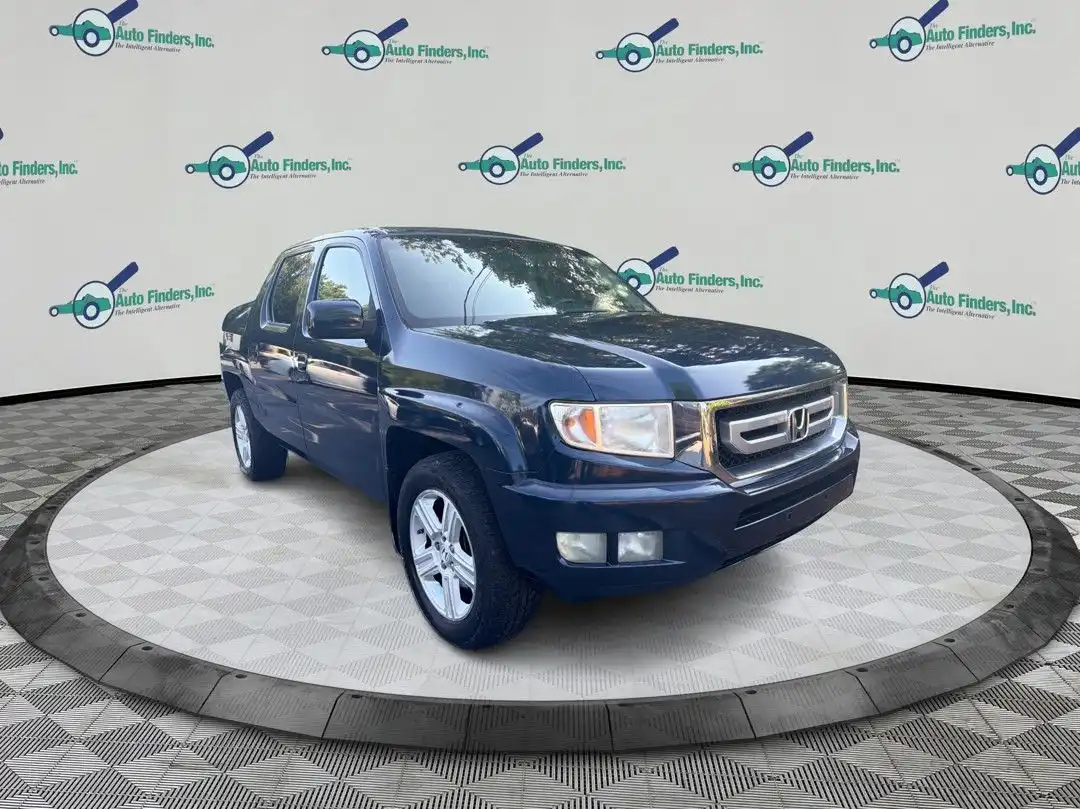 2009 Honda Ridgeline 3.5 Auto RTL w/Leather and Navi's photo