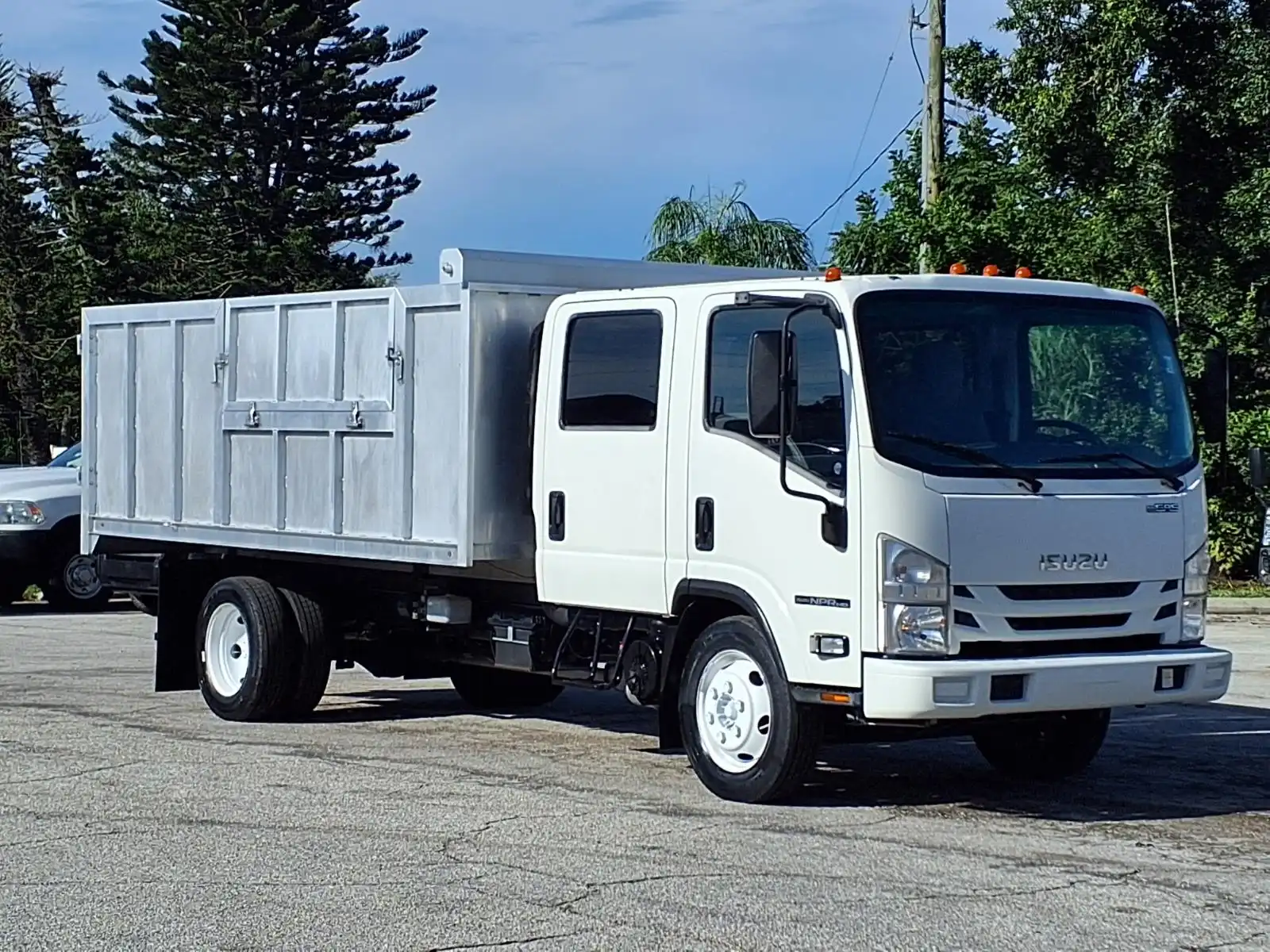 2021 Isuzu NPR-HD Crew Cab 14 Landscape Dump Truck's photo
