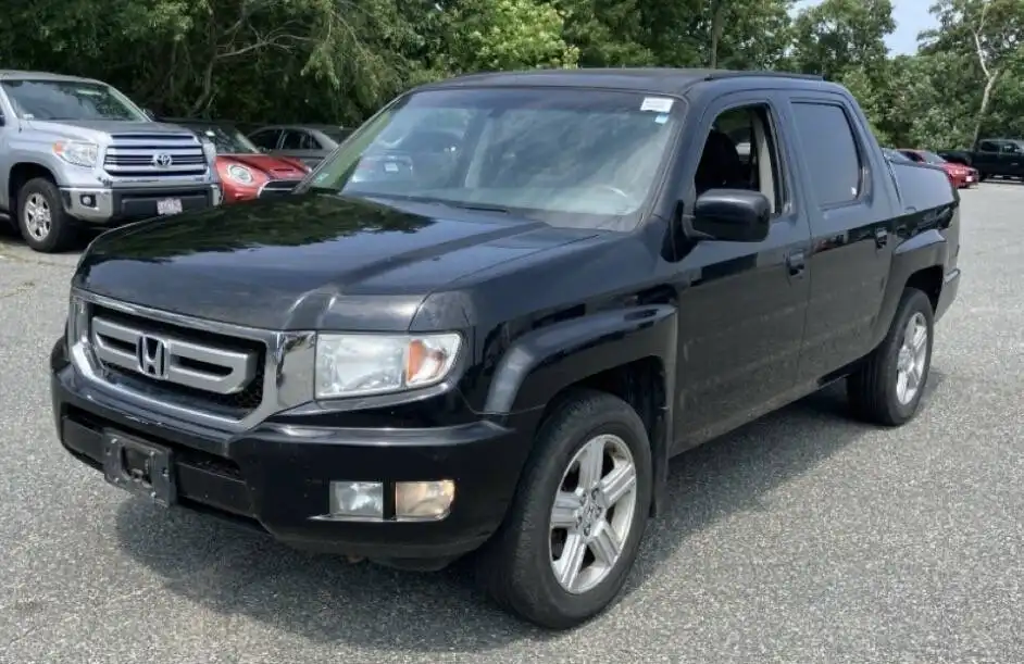 2009 Honda Ridgeline 3.5 Auto RTL w/Leather and Navi's photo
