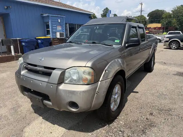 2004 Nissan Frontier SC 4WD Crew Cab V6 Long Bed Auto's photo