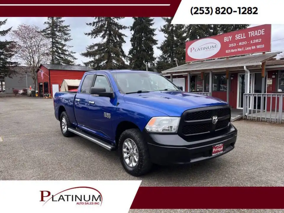 2016 RAM 1500 SLT Quad Cab 4WD 6'4" Box's photo