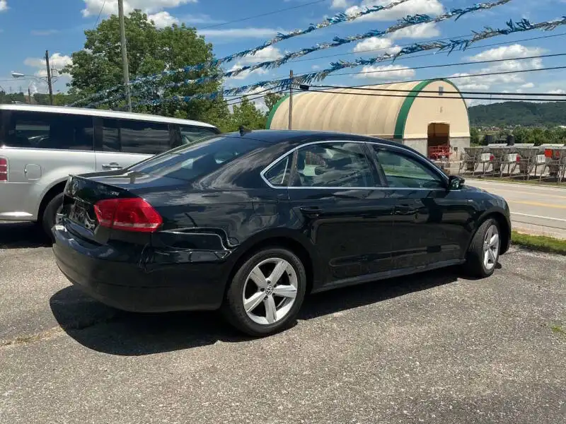 2014 Volkswagen Passat 1.8T S DSG PZEV's photo