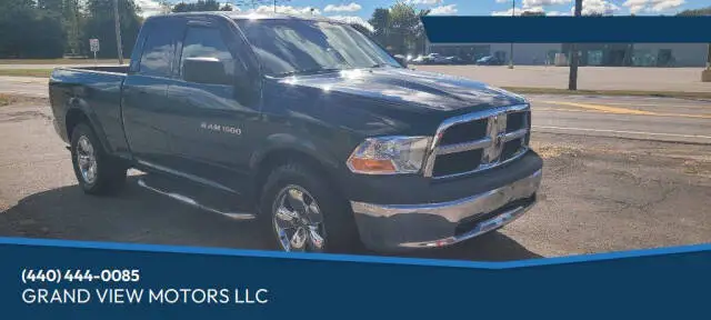 2011 RAM 1500 ST 4x4 Quad Cab photo 1