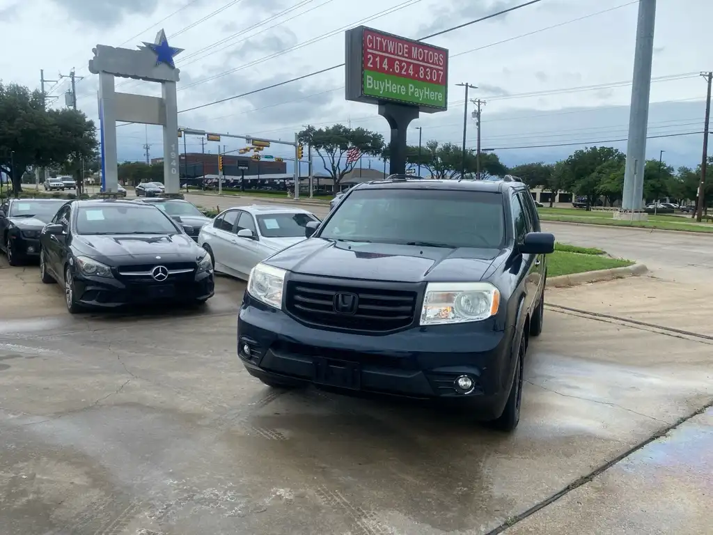 2012 Honda Pilot Touring 4WD Navigation RES's photo