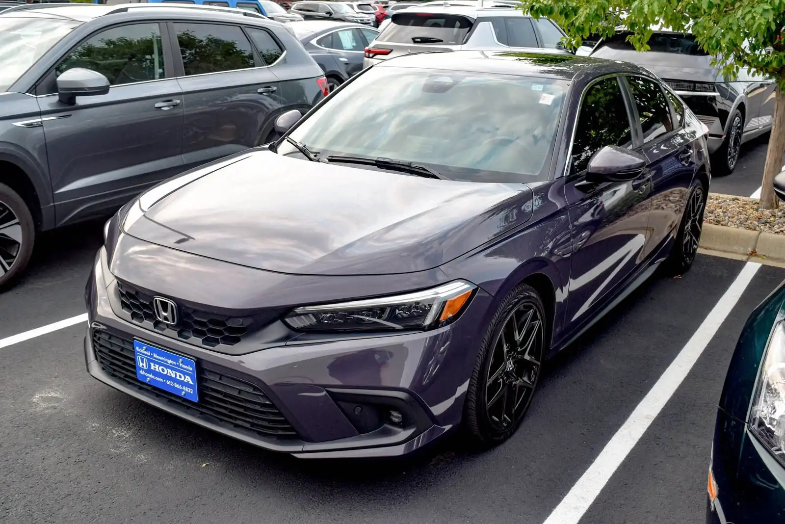 2024 Honda Civic Sport Touring CVT's photo