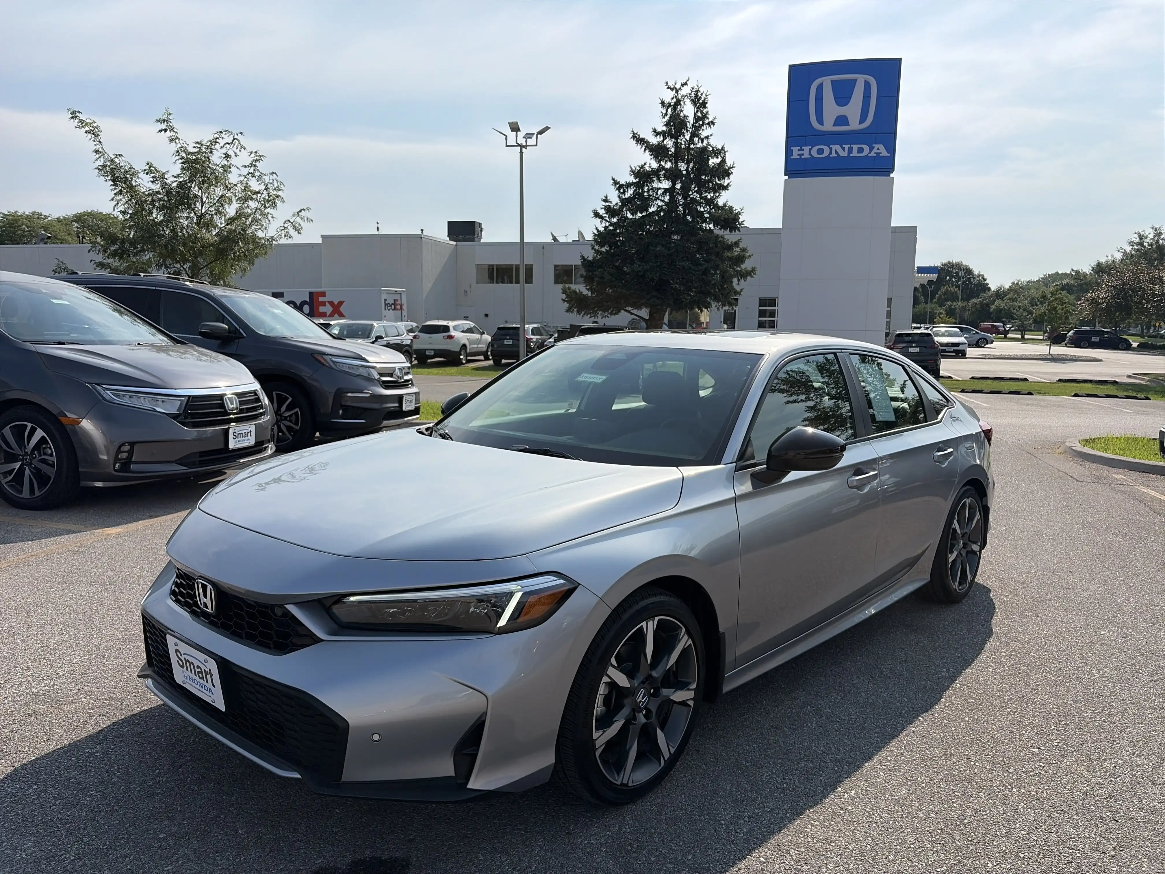 2026 Honda Civic Sport Touring Hybrid CVT's photo