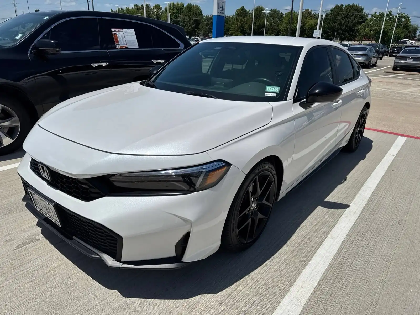 2026 Honda Civic Sport CVT's photo