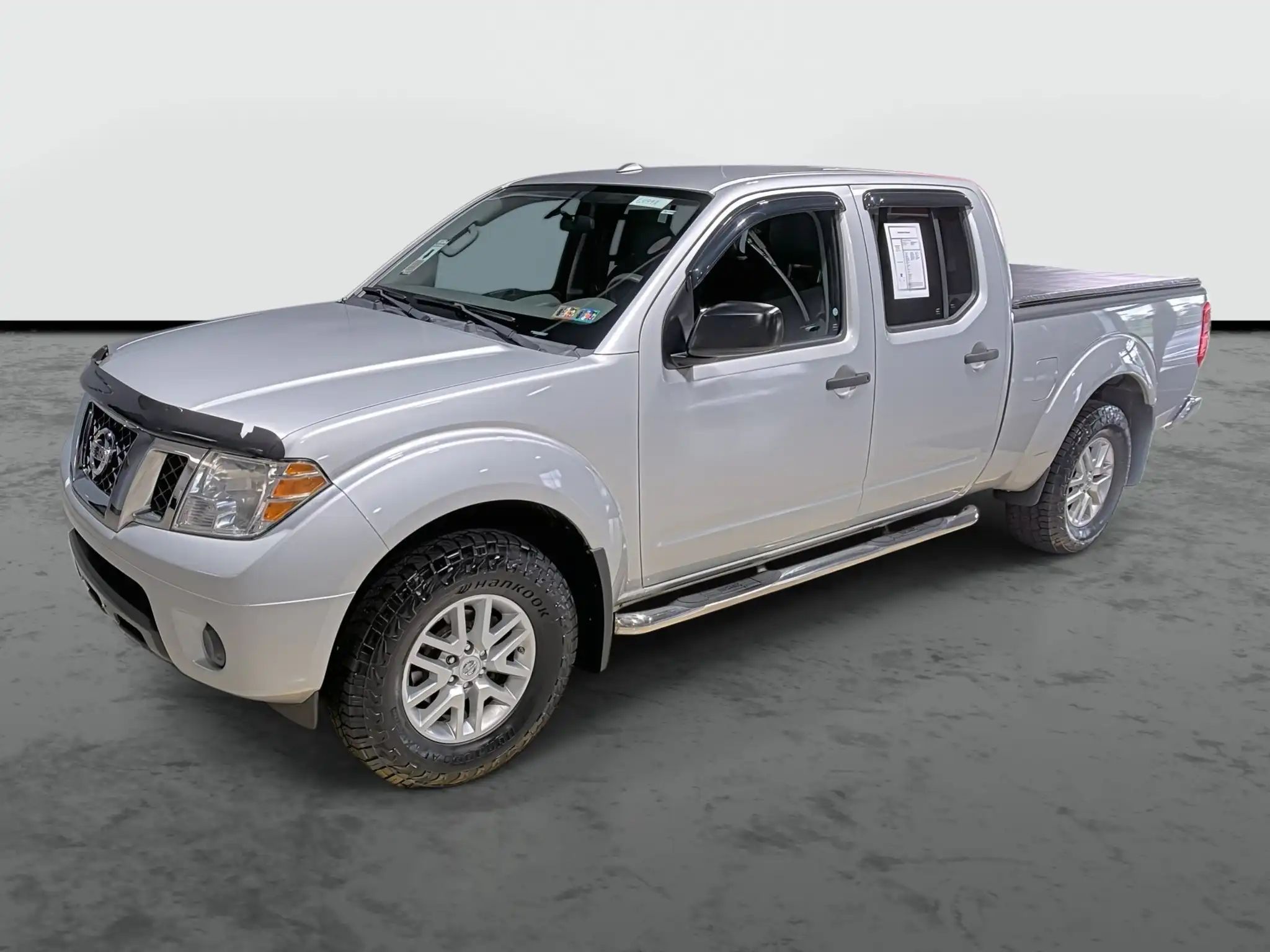 2016 Nissan Frontier 4.0 SV Crew Cab 4X4 AT LWB's photo