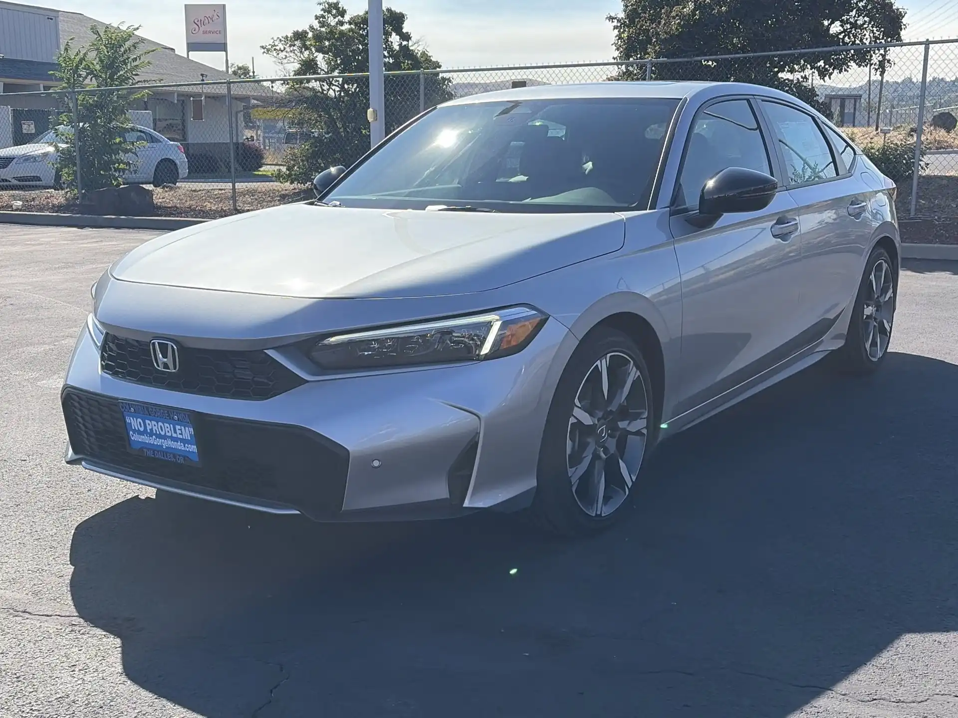 2026 Honda Civic Sport Touring Hybrid CVT's photo