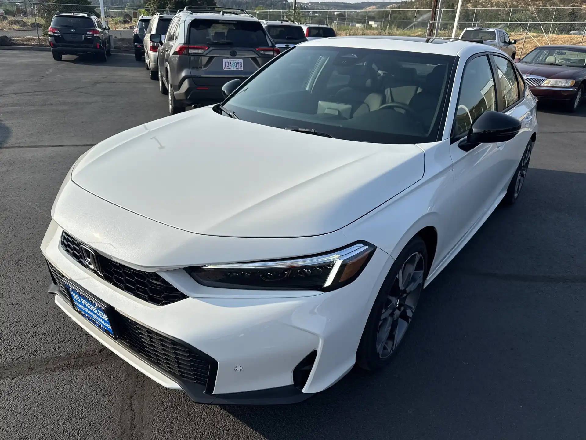 2026 Honda Civic Sport Touring Hybrid CVT's photo