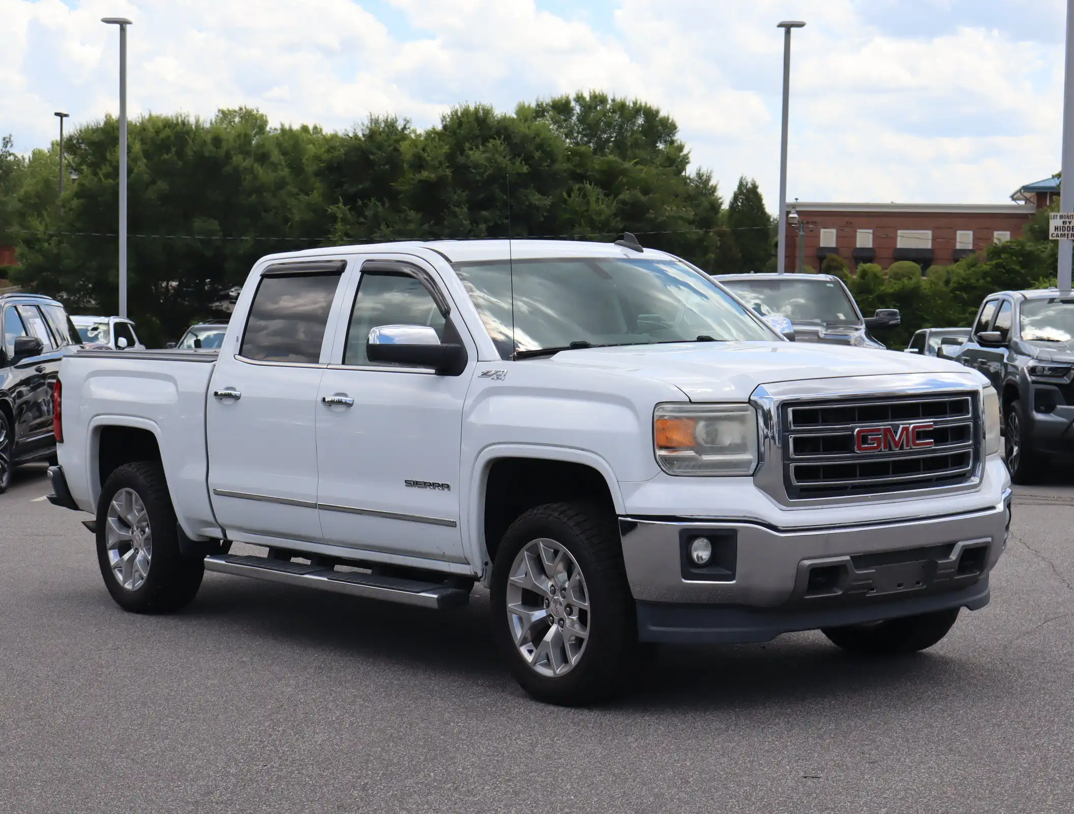 2015 GMC Sierra 4WD Crew Cab SLT SWB's photo