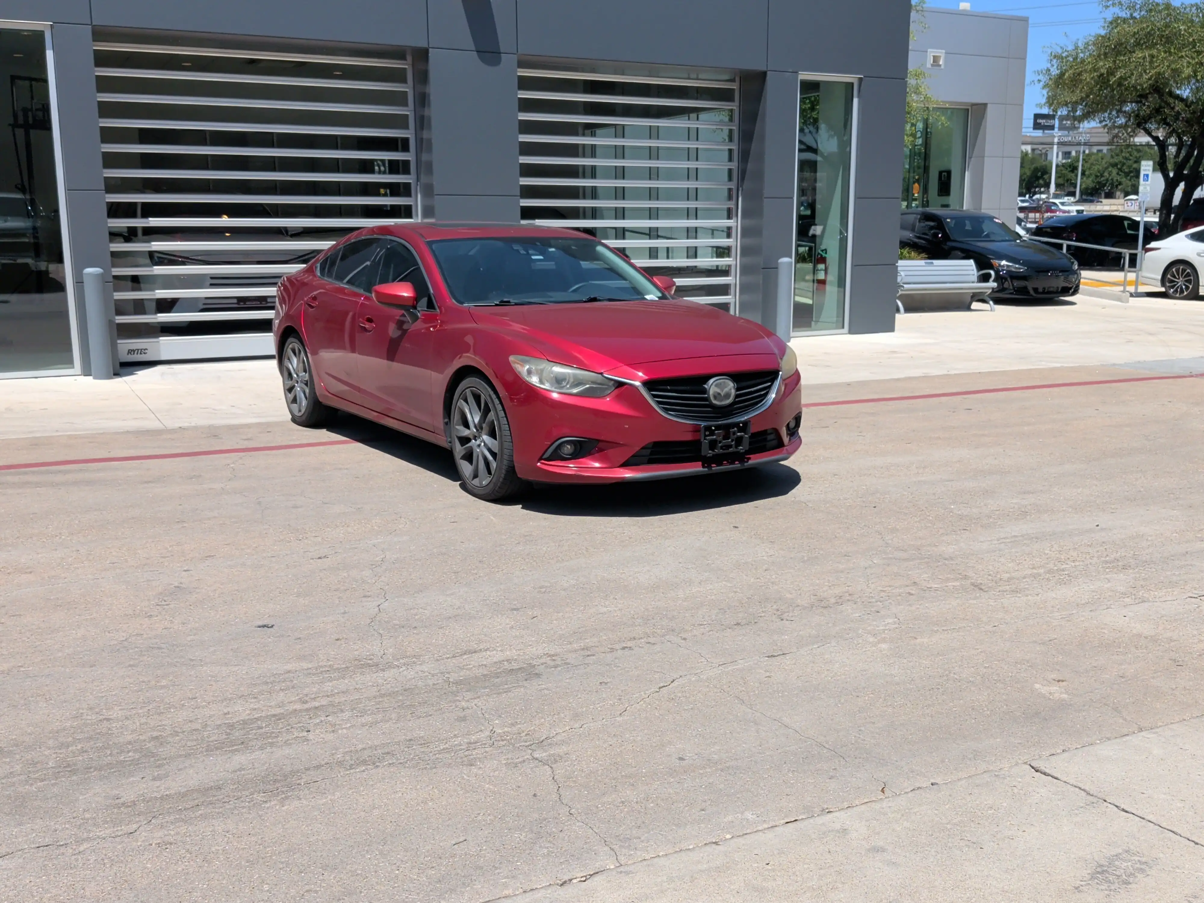 2015 Mazda EZ-6 i Grand Touring Auto's photo