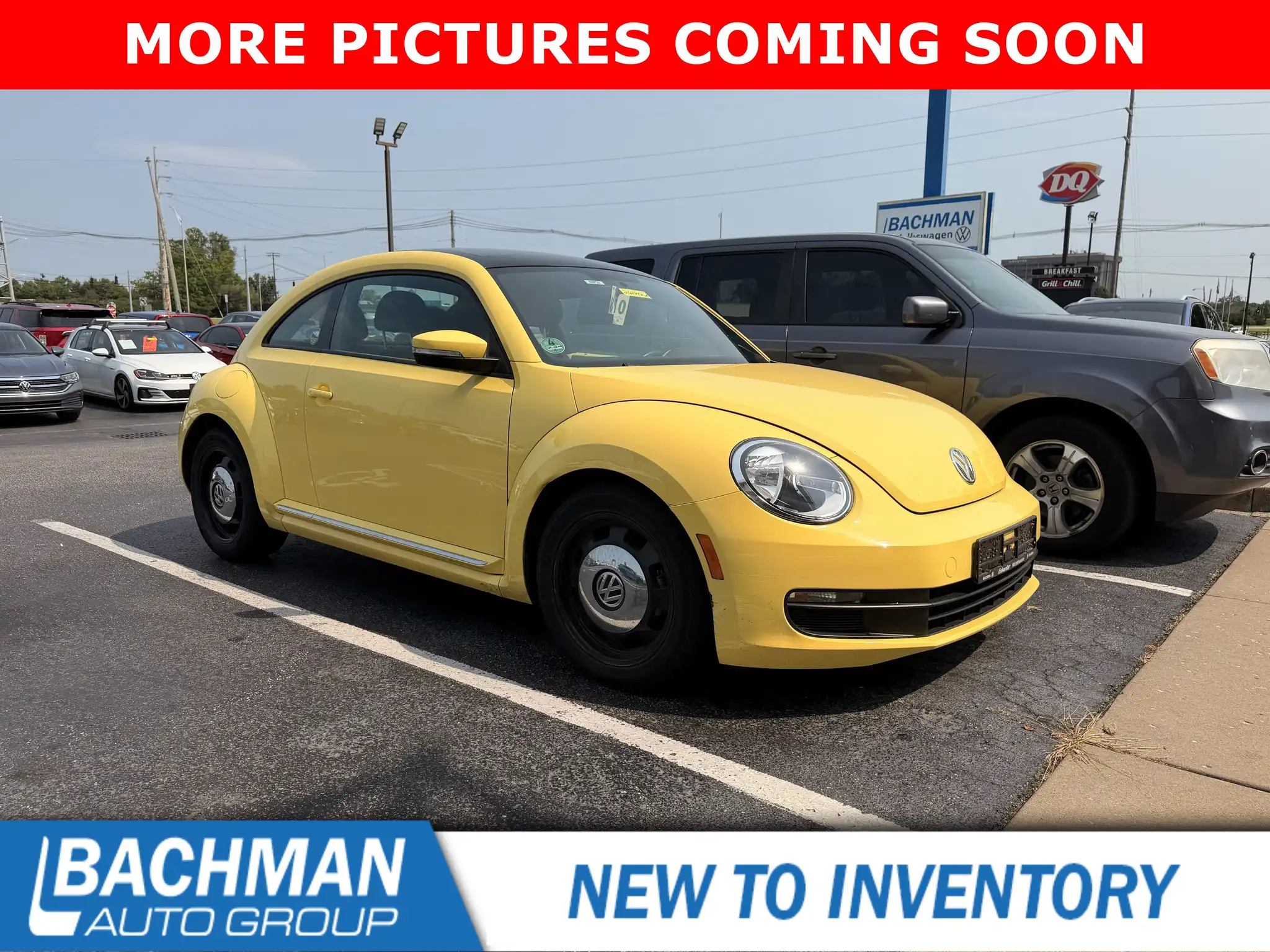 2012 Volkswagen Beetle 2.5L Auto w/Sunroof, Sound & Nav. PZEV's photo