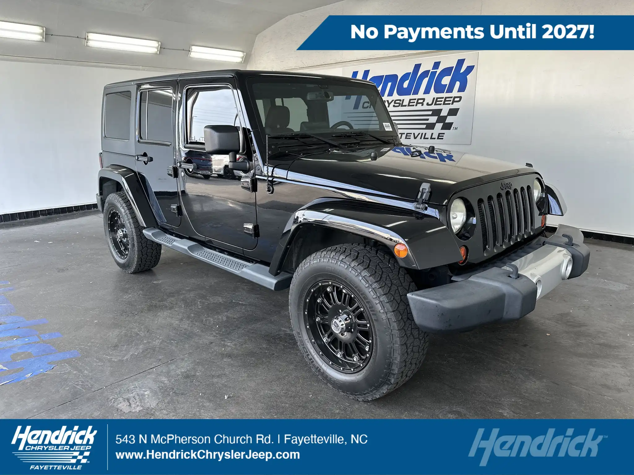 2013 Jeep Wrangler Pre-Owned 2013 Jeep Unlimited Sahara Convertible 4WD's photo