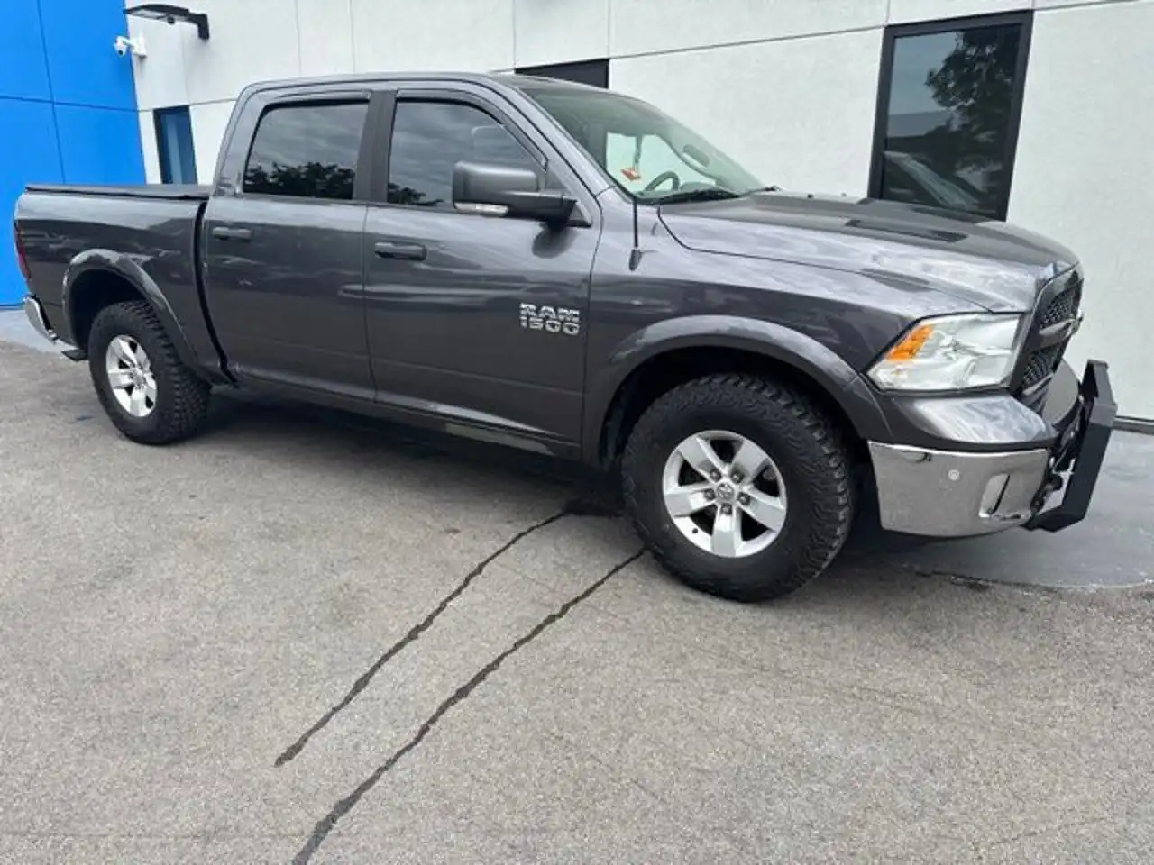 2016 RAM 1500 Outdoorsman 4WD Crew Cab 5'7's photo
