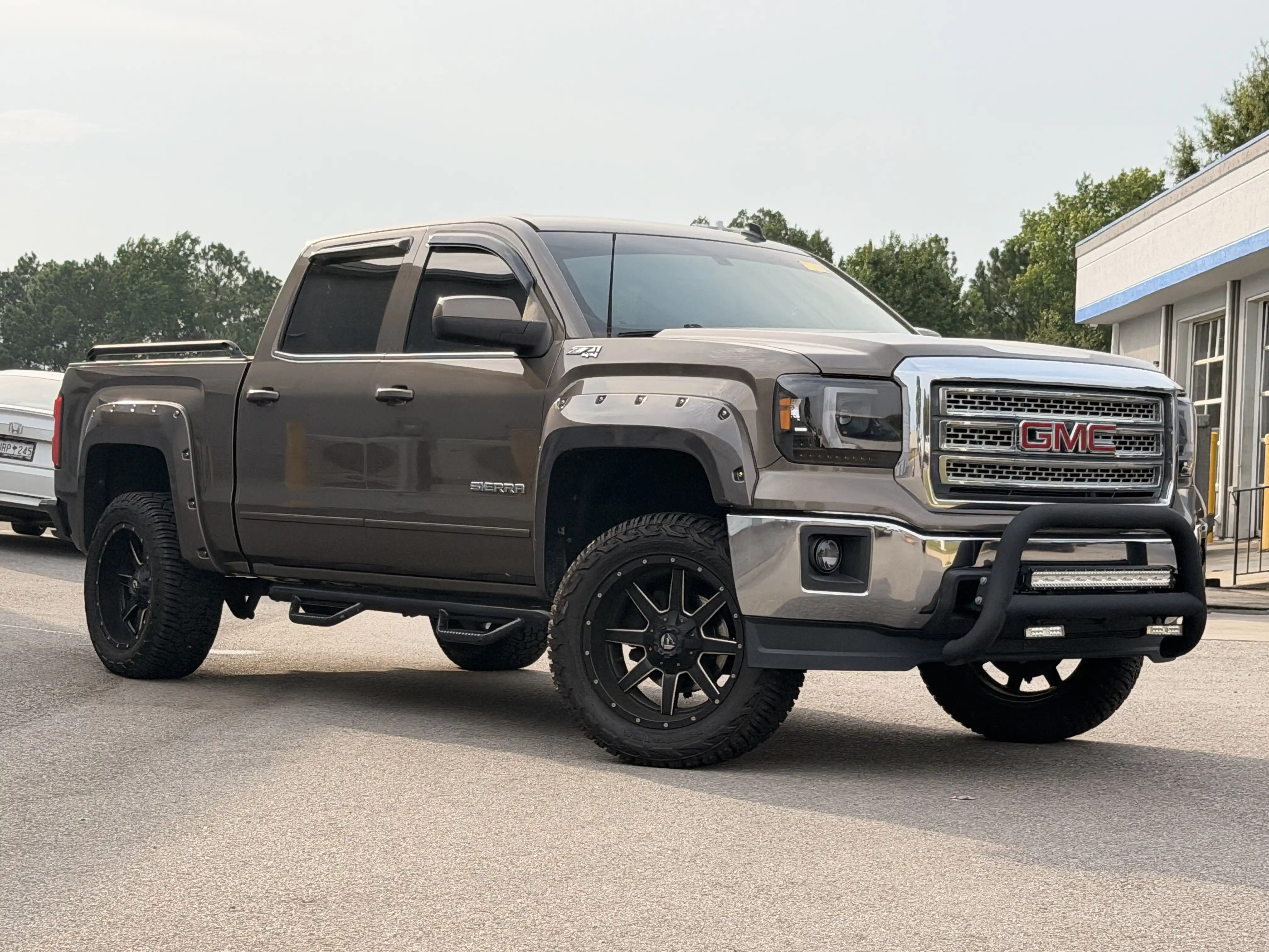 2014 GMC Sierra 4WD Crew Cab SLE LWB's photo