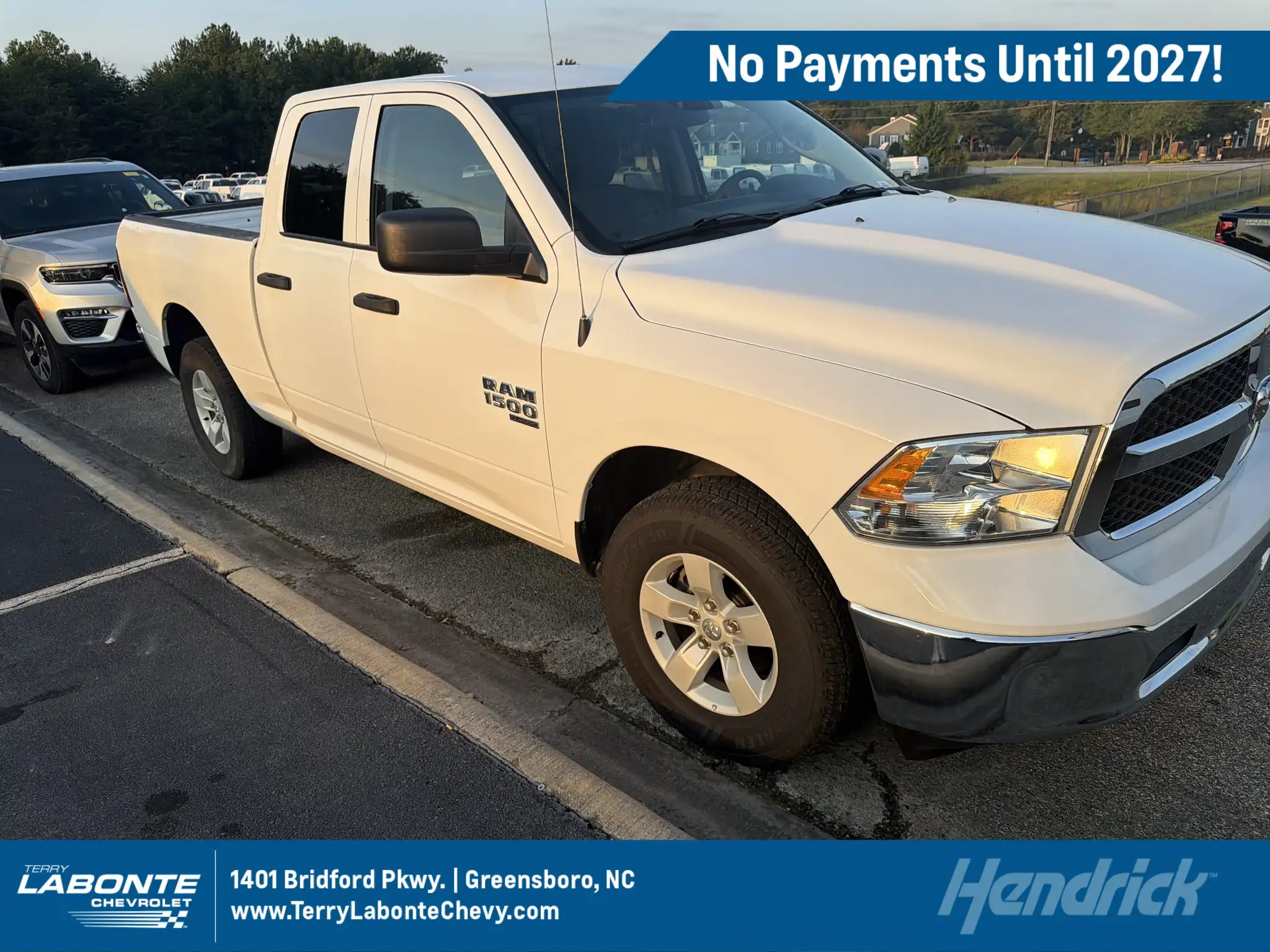 2024 RAM 1500 Classic SLT 4WD Quad Cab 6'4's photo