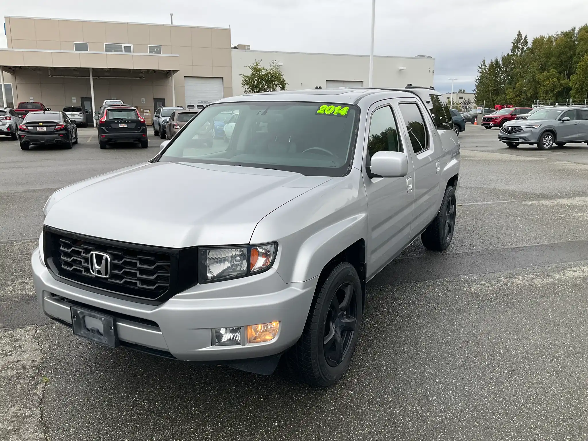 2014 Honda Ridgeline SE Navigation Leather's photo