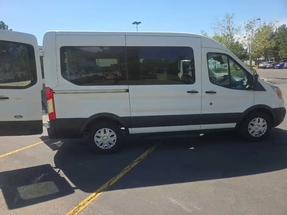 2017 Ford Transit 150 XLT Wagon Med Roof Sliding Pass. 130's photo