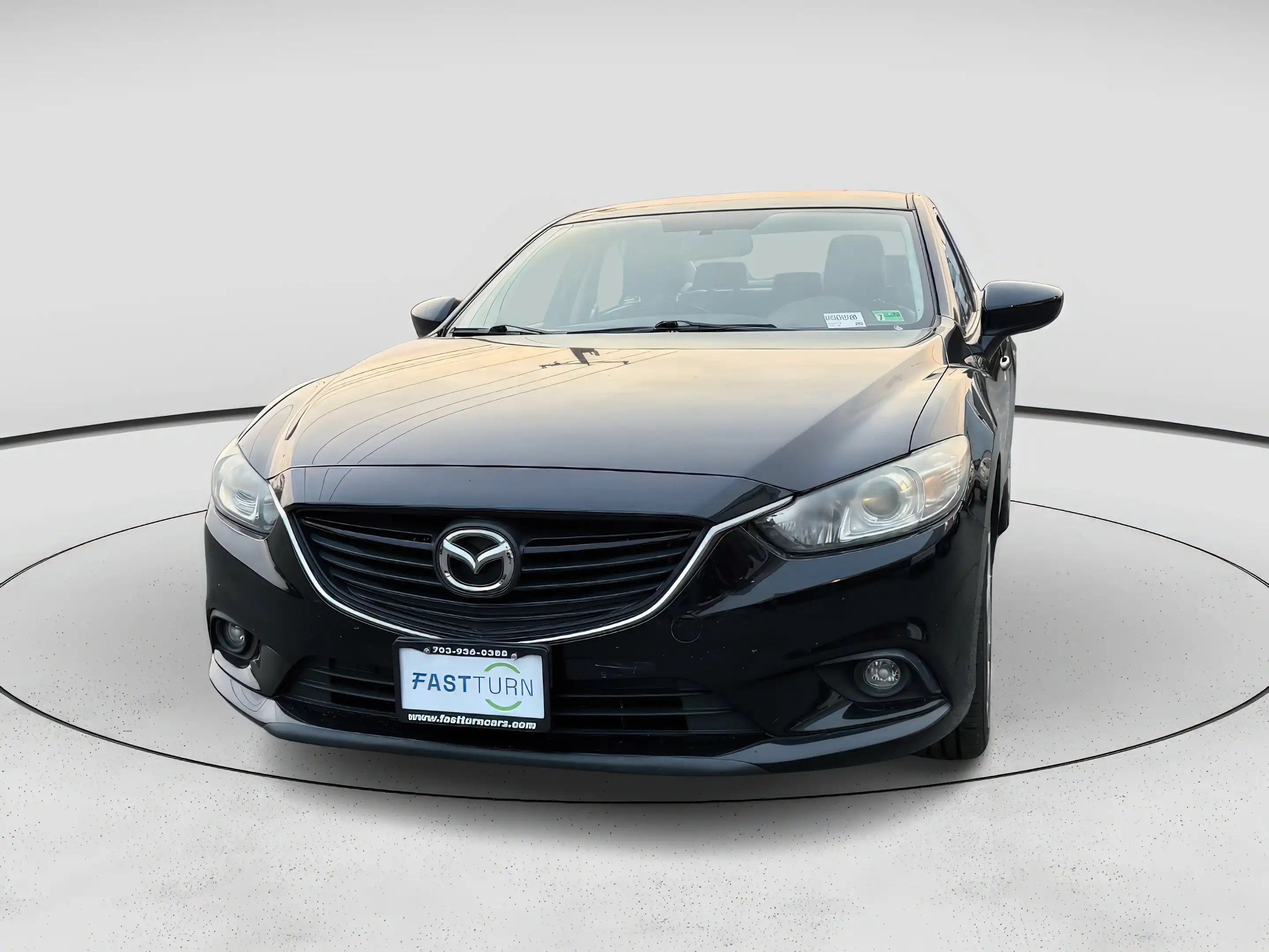 2014 Mazda EZ-6 i Touring Auto's photo