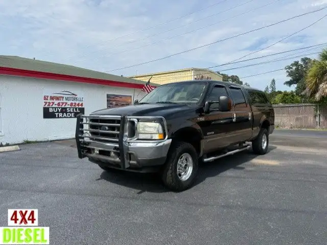 2003 Ford F-250 Lariat 4WD Crew Cab SWB's photo