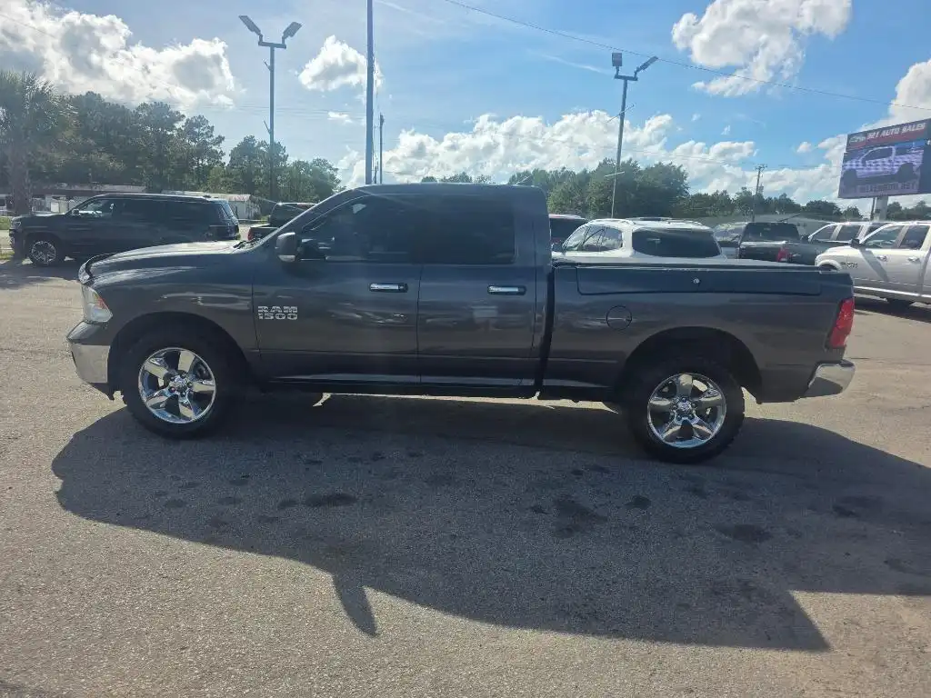 2016 RAM 1500 Big Horn 4WD Quad Cab 6'4's photo