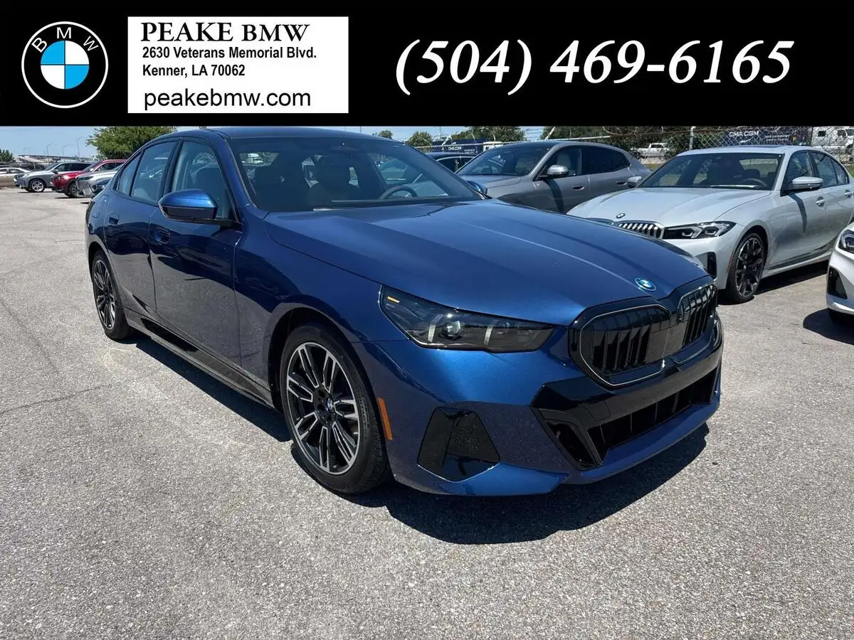 2026 BMW 5 Series 550e xDrive Sedan's photo