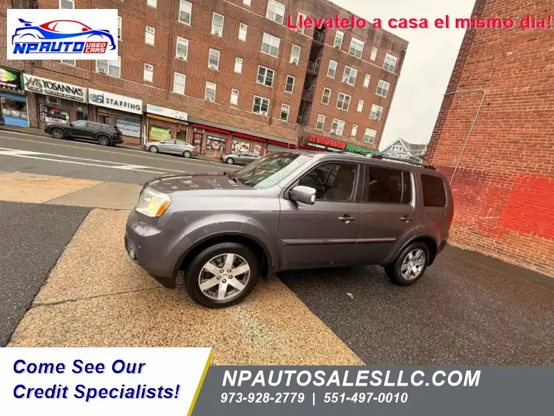 2015 Honda Pilot Touring 4WD Navigation RES's photo