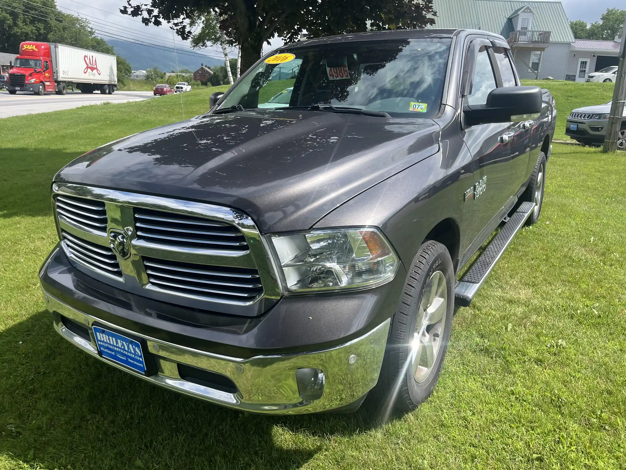 2016 RAM 1500 Big Horn 4WD Quad Cab 6'4's photo