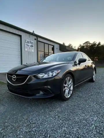 2015 Mazda EZ-6 i Touring Auto's photo
