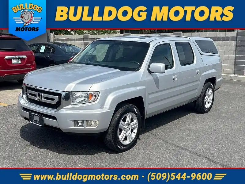 2009 Honda Ridgeline 3.5 Auto RTL w/Leather and Navi's photo
