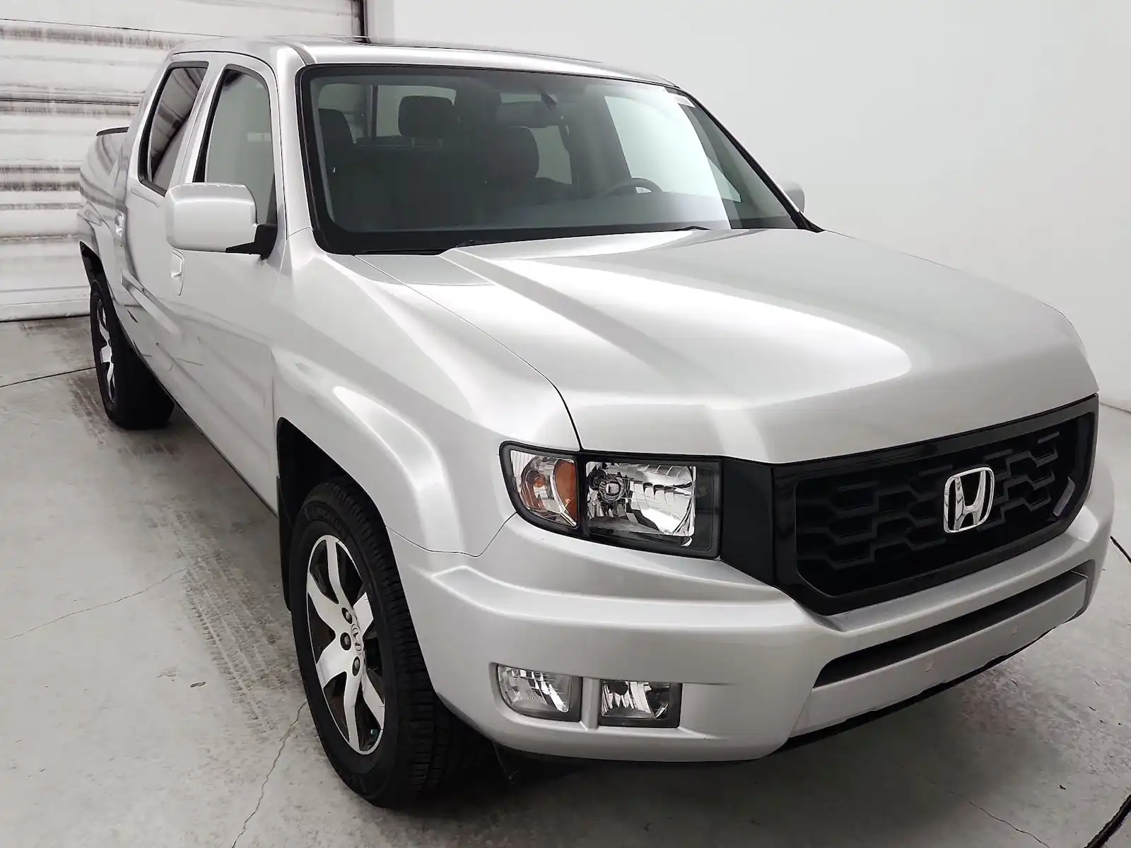 2014 Honda Ridgeline SE Navigation Leather's photo