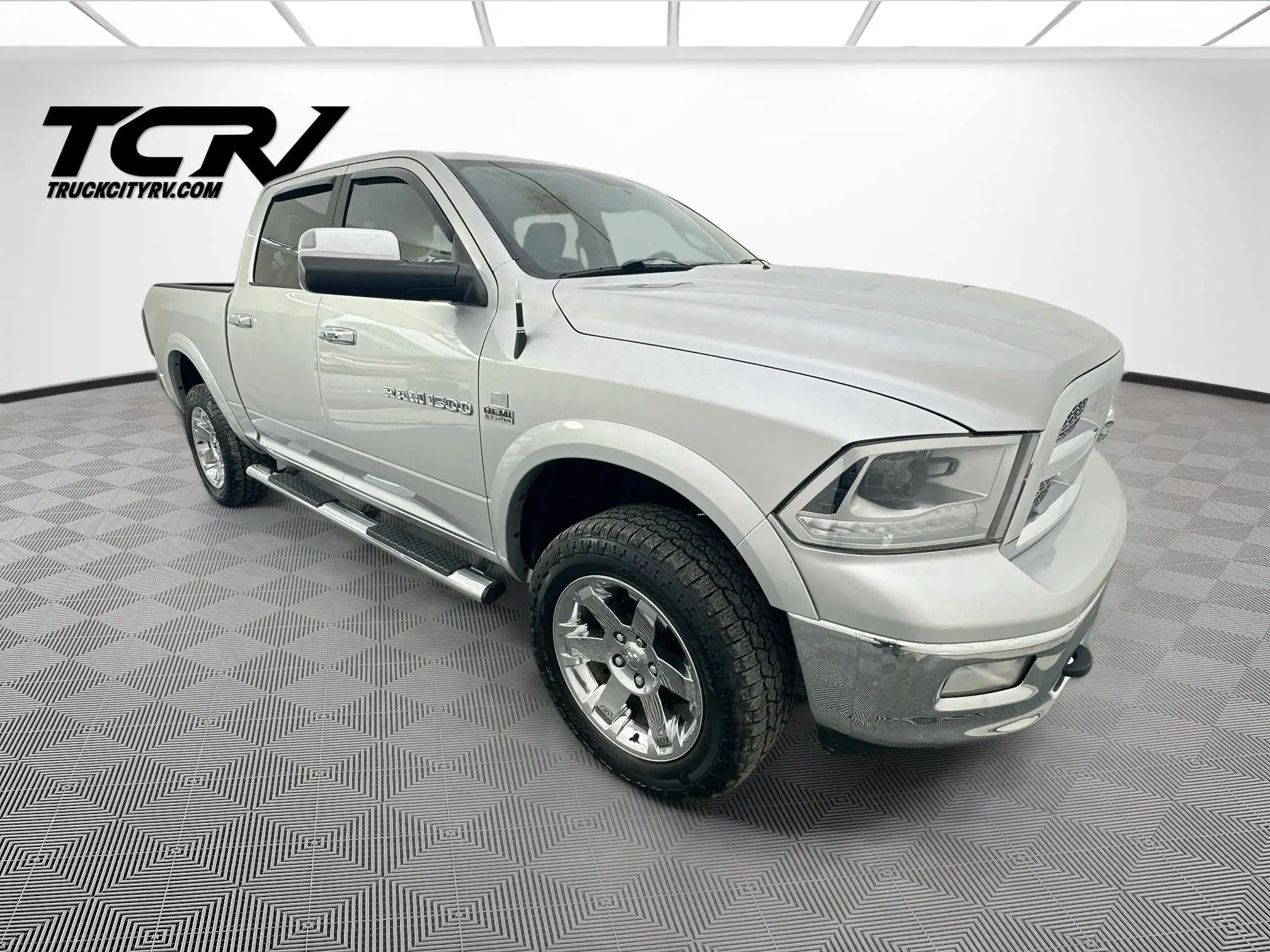 2012 RAM 1500 Laramie 4WD Crew Cab's photo