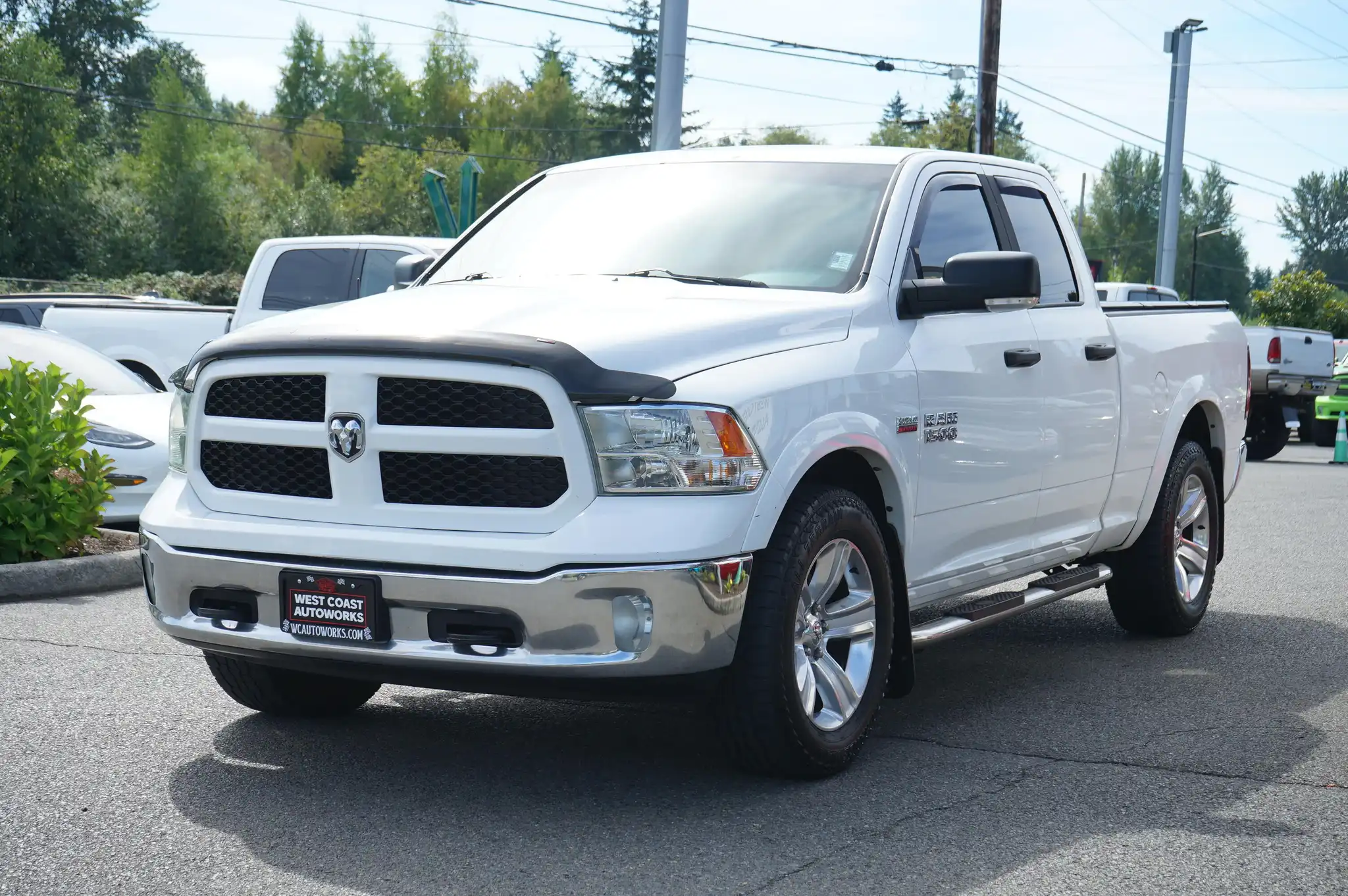 2015 RAM 1500 Outdoorsman Quad Cab 4WD's photo