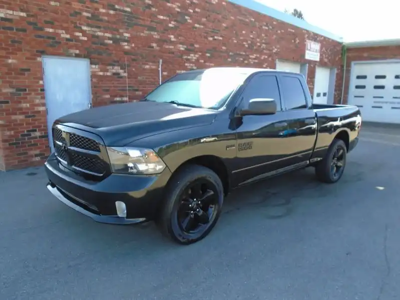 2016 RAM 1500 Express 4WD Quad Cab 6'4's photo