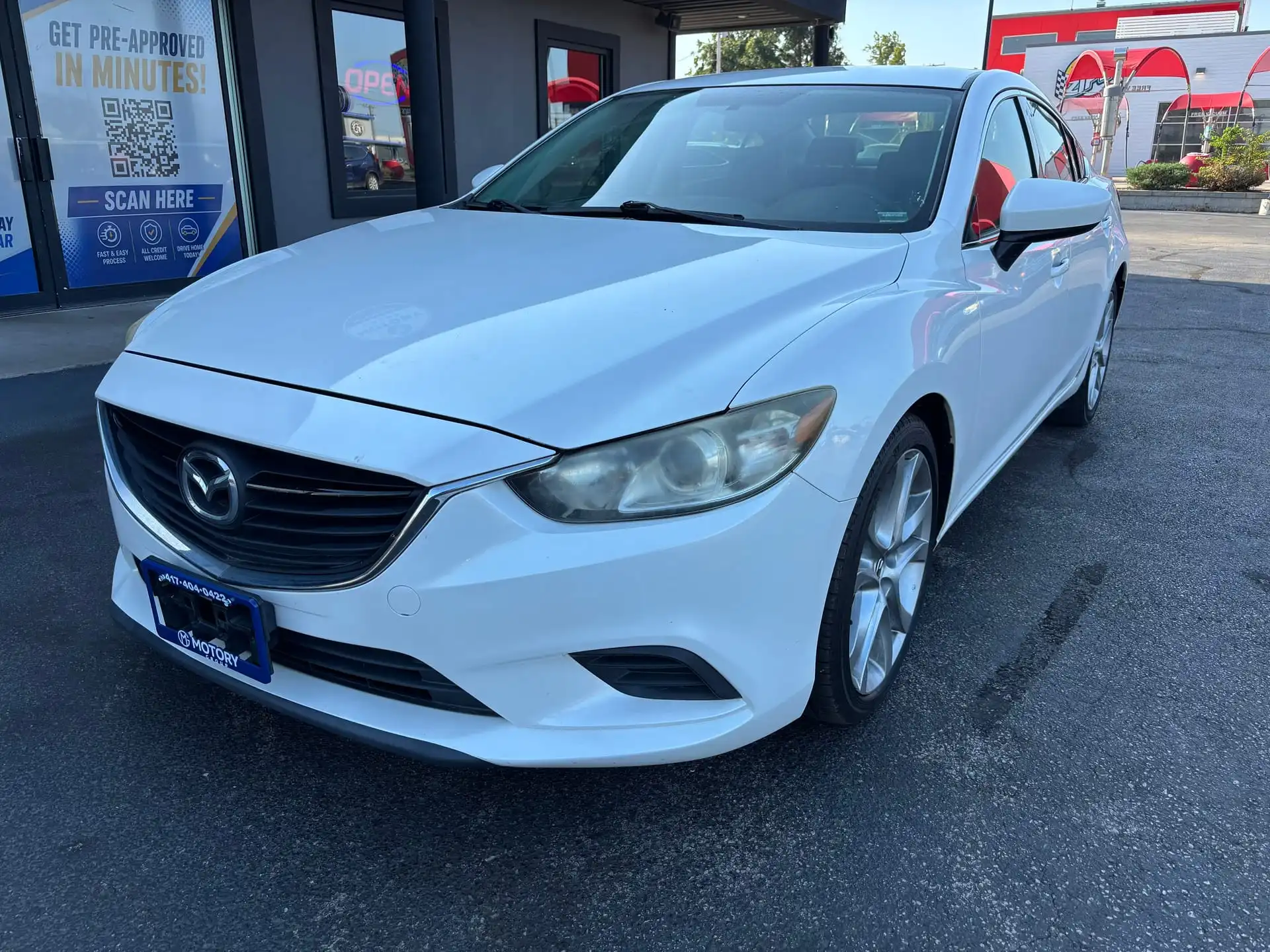 2015 Mazda EZ-6 Touring Auto i's photo