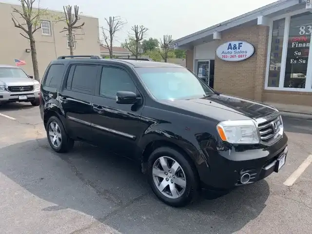 2014 Honda Pilot 4WD Touring w/RES & Navigation's photo