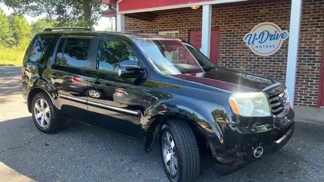 2012 Honda Pilot Touring 4WD Navigation RES's photo