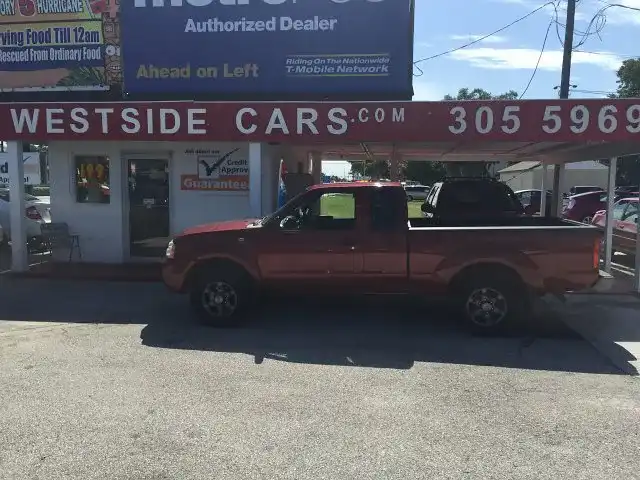2004 Nissan Frontier XE King Cab V6 Desert Runner Auto's photo