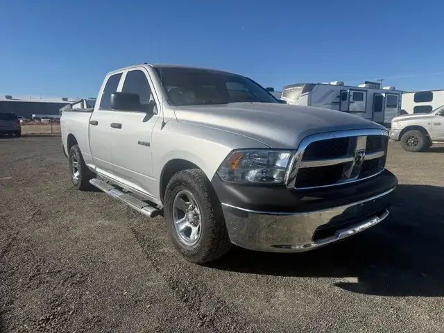 2010 RAM 1500 ST Quad Cab photo 1