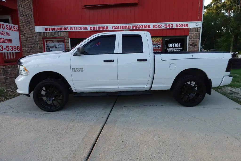 2016 RAM 1500 Express 4WD Quad Cab 6'4's photo