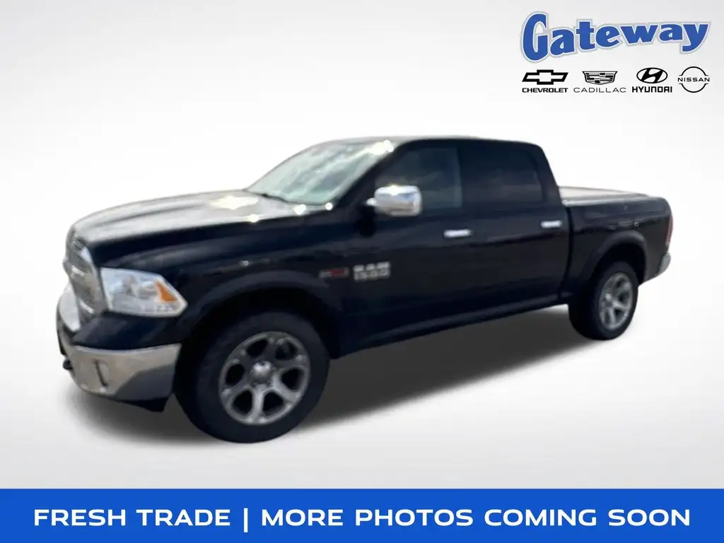 2018 RAM 1500 Laramie 4WD Crew Cab 5'7's photo